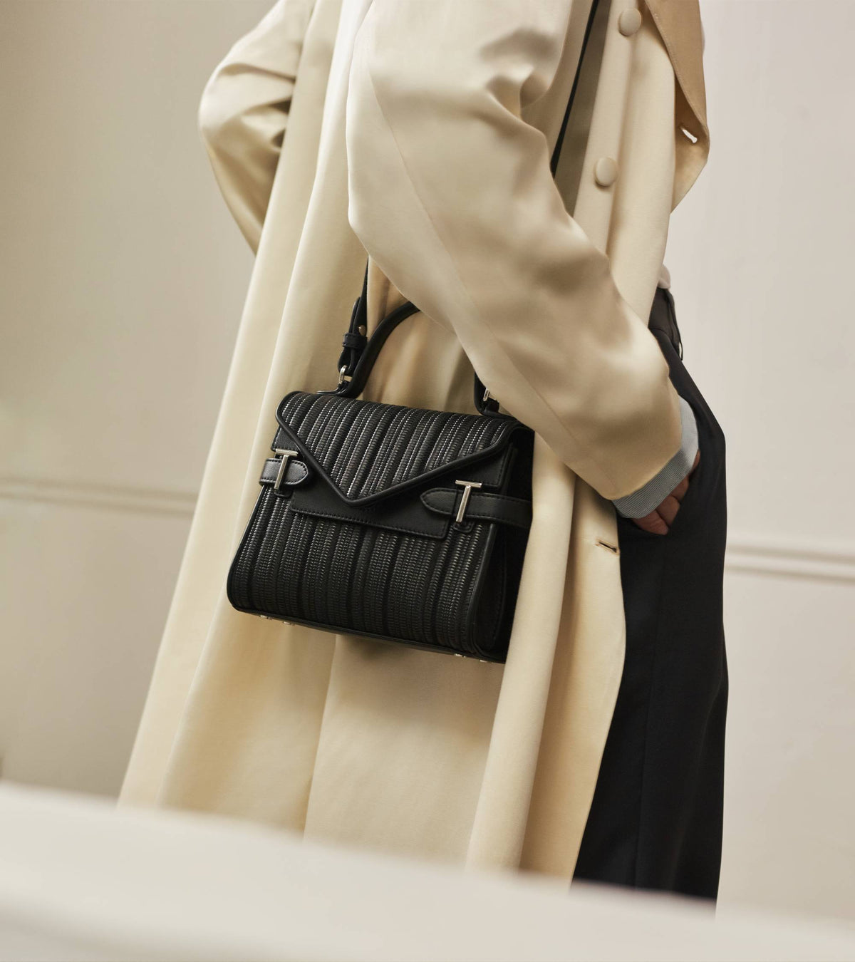 Emilie small handbag with double-flap in braided recycled leather